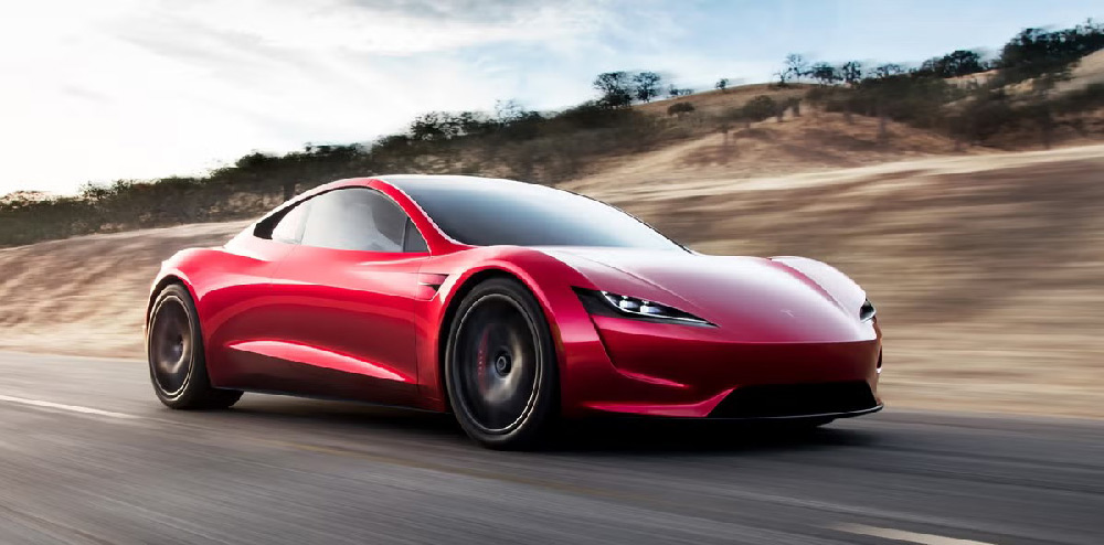 Tesla showroom showcasing electric vehicles, highlighting the brand's direct-to-consumer sales strategy.